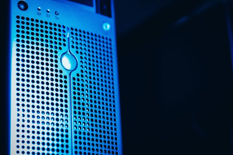 Blue-lit server hardware in a managed data centre