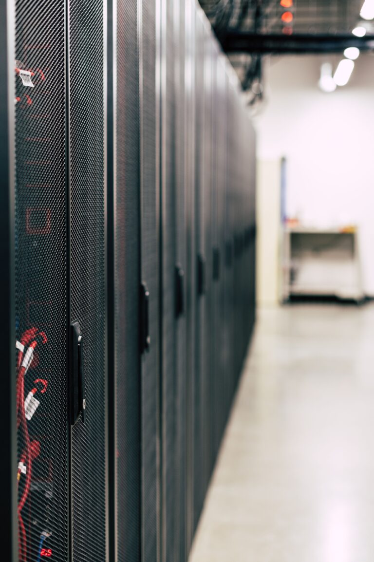 Rows of managed server racks in a modern data centre