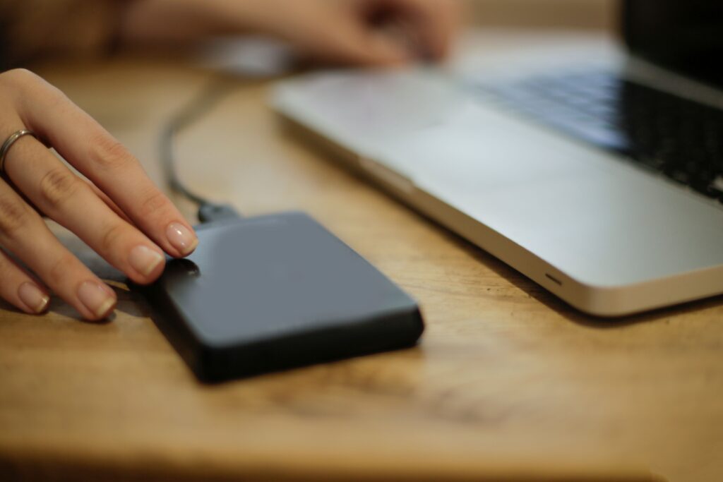External storage device connected to a laptop for data transfer
