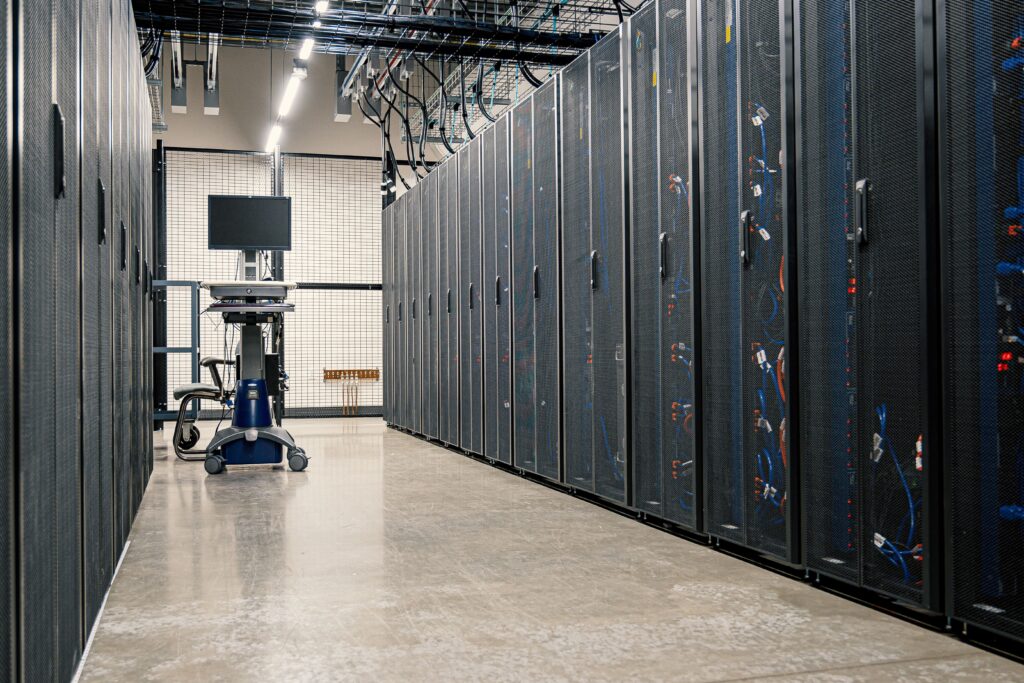 Secure modern data centre corridor with server racks