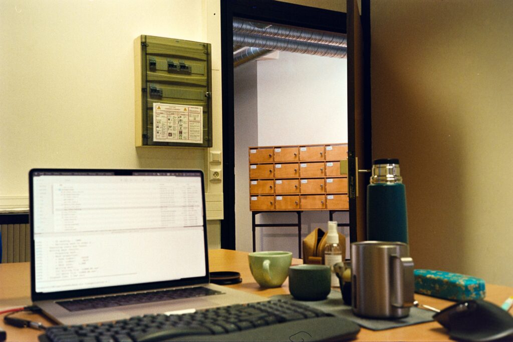 Laptop workspace used for website development and maintenance